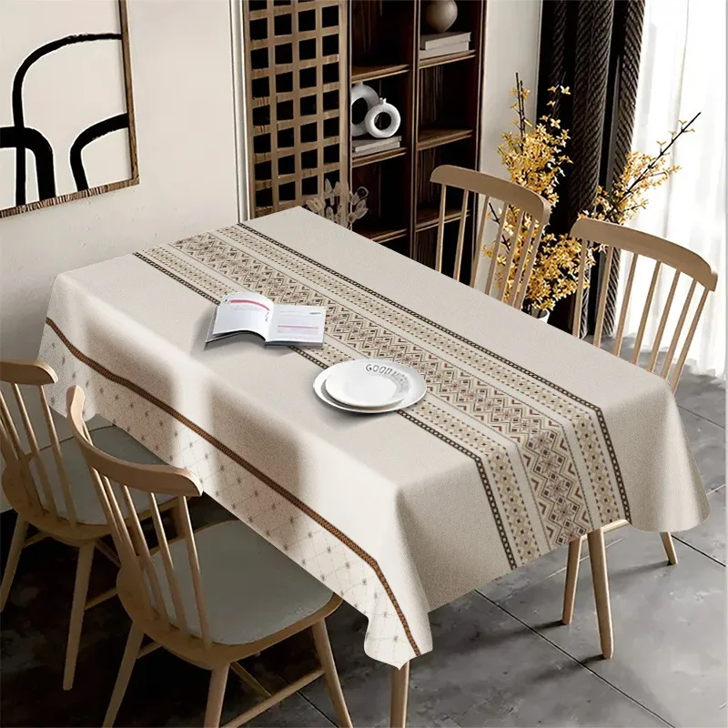The tablecloth features elegant white and brown geometric patterns, suitable for a wide range of occasions.