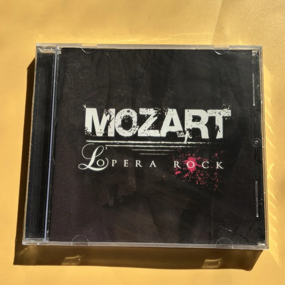 Mozart L'Opera Rock CD | Rock-Opern-Soundtrack | Elektrifizierende Gesänge & Dramatische Melodien | Theatralisches Musikerlebnis-Disc