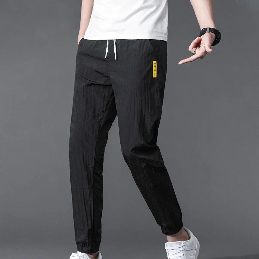 Pantalones deportivos elásticos de verano para hombre, pantalón de chándal informal para correr, entrenamiento al aire libre, gimnasio, Fitness