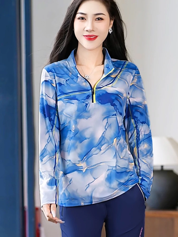 เสื้อยืดแขนยาวผ้าไหมน้ำแข็งลายพราง แห้งเร็ว บางเบา ระบายอากาศดี คอตั้ง สำหรับผู้หญิง ชุดออกกำลังกายกลางแจ้ง ผ้าโพลีเอสเตอร์...