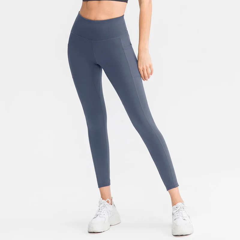 Mallas de Yoga desnudas con bolsillos para mujer, Leggings sin costuras de cintura alta, Leggings Push Up, ropa deportiva para trotar, traje de gimnasio, pantalones de entrenamiento ajustados