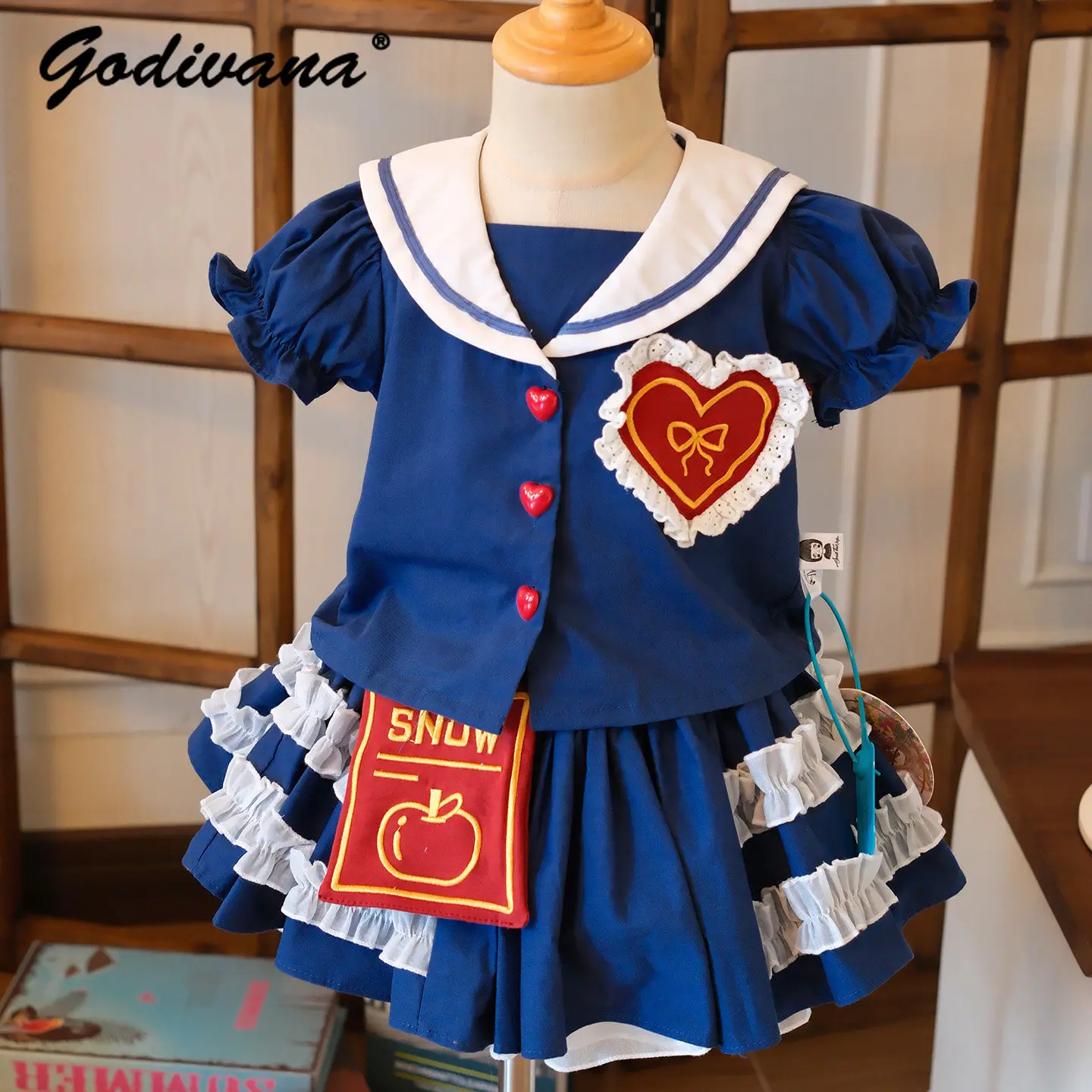 

Original Sweet and Cute Little Girls Preppy Style Jk Skirt Set Kids 2026 New Summer Blue Puff Sleeve Lace Trim Pleated Skirt