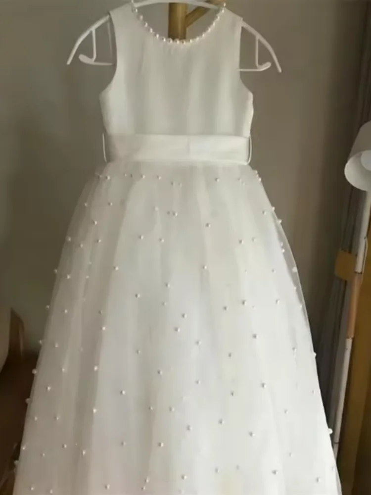 

Elegant Ivory Flower Girl Wedding Dress with Pearl Bow Belt Princess Dress for Children's Birthday Parties and First Communion