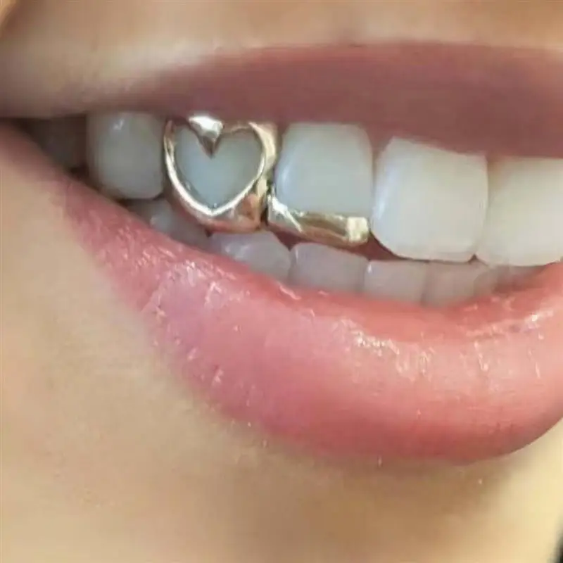 retentor-dental-de-dupla-faixa-com-coracao-vazado-dourado-superficie-lisa-estilo-hip-hop-acessorio-moderno-para-uso-diario