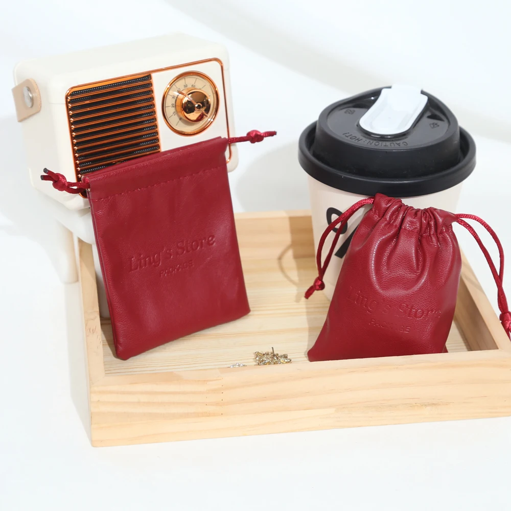 50/100 шт. шикарные индивидуальные ювелирные изделия из искусственной кожи, сумка на шнурке, подарочная упаковка, сумки для сережек, косметический органайзер для париков, карман для хранения