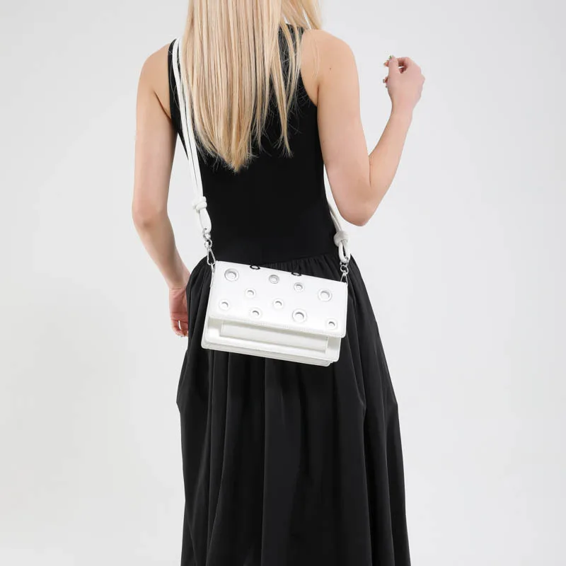 

Fashion senior niche rivets handheld biker bag simple texture temperament Yankee single shoulder crossbody women's bags