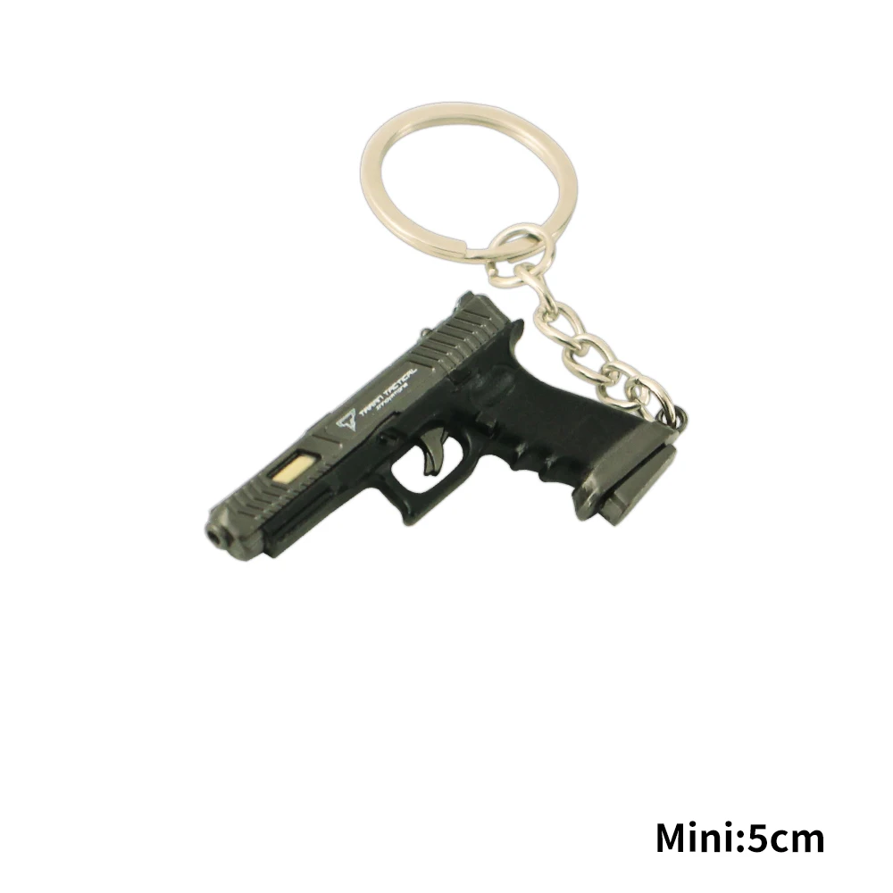 Mini Toy Gun ttiG34 Metalen sleutelhanger Glock Colt 1911 Pistool Wapenmodel Miniatuur Legering Collectie Volwassen hanger Vakantiegeschenken