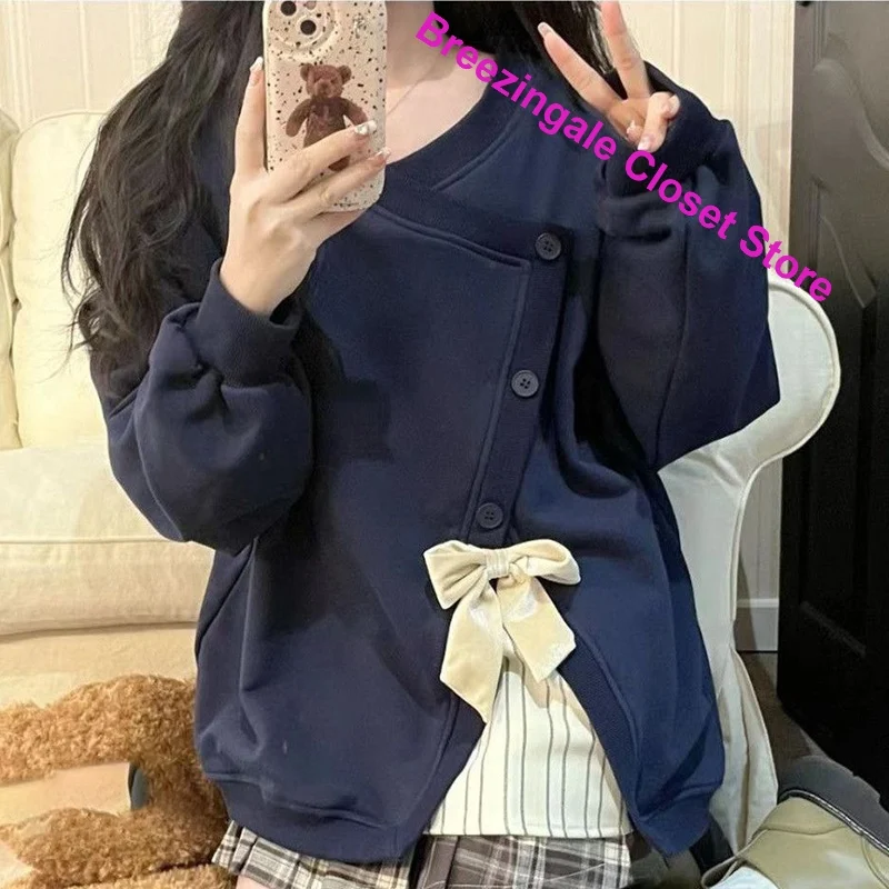 Korean version of advanced sense stitching irregular bow stitching sweater women's spring and autumn new loose slim casual top