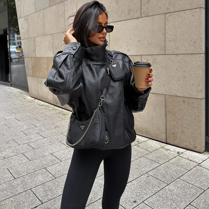 Chaqueta de piel sintética a la moda para mujer, abrigo de calle con cuello levantado y botones con cremallera y bolsillo empalmado para otoño e invierno