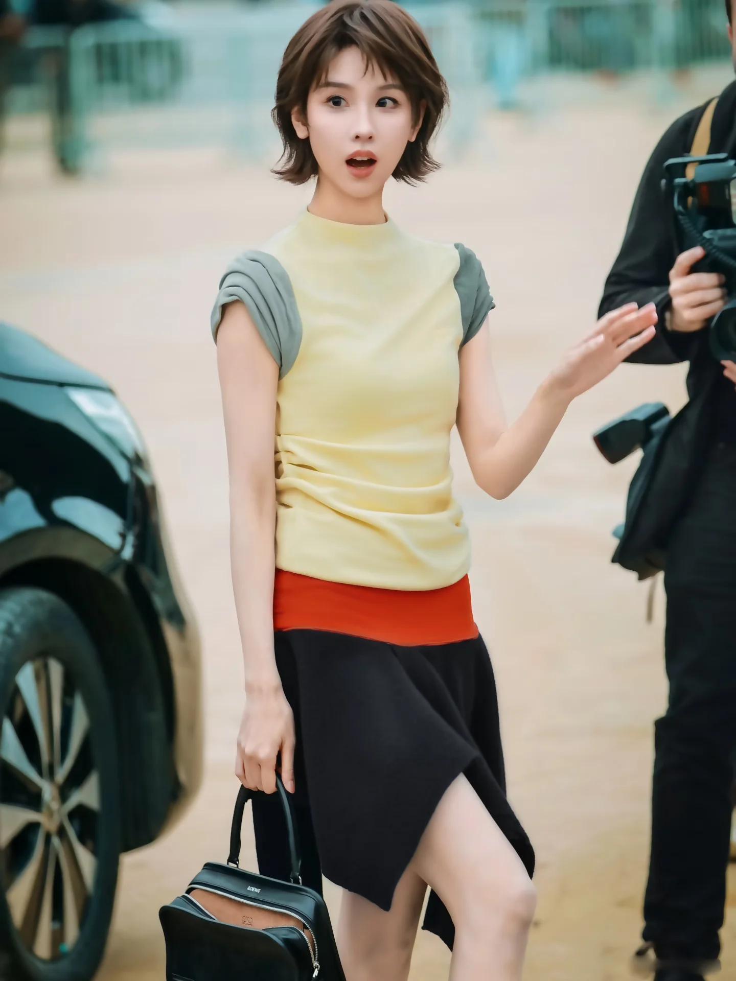 Paris Show Yellow Short Sleeve T-Shirt Pleated Cuff High Waist Asymmetrical Hem Skirt Set Casual Style Women's Cotton Blend