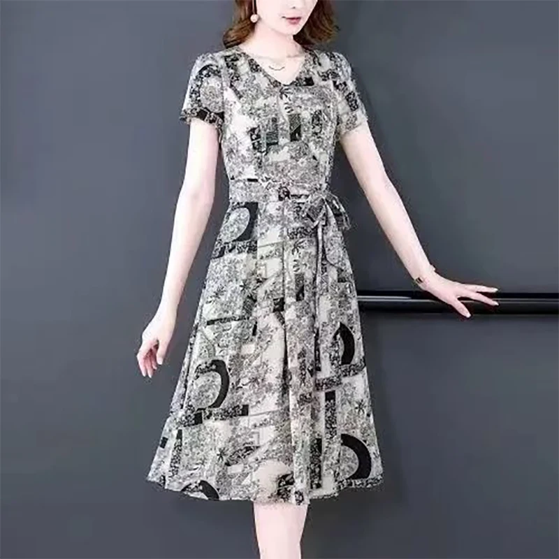 Mode V-Ausschnitt Kurzarm bedruckte Bandage Vintage Kleid Damen bekleidung Sommer neue lose Büro Dame Blumen kleider