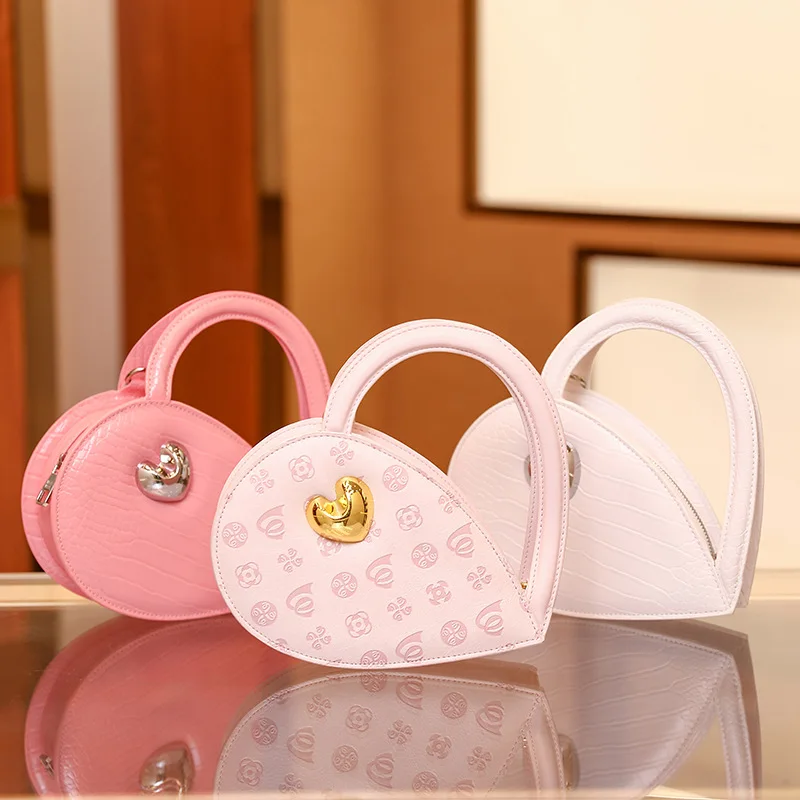 

Niche Design Sweet Cute Bag Love Bag Designer Women's Handbag Hollow Women's 2024 New Fashion Versatile Shoulder Crossbody Bag