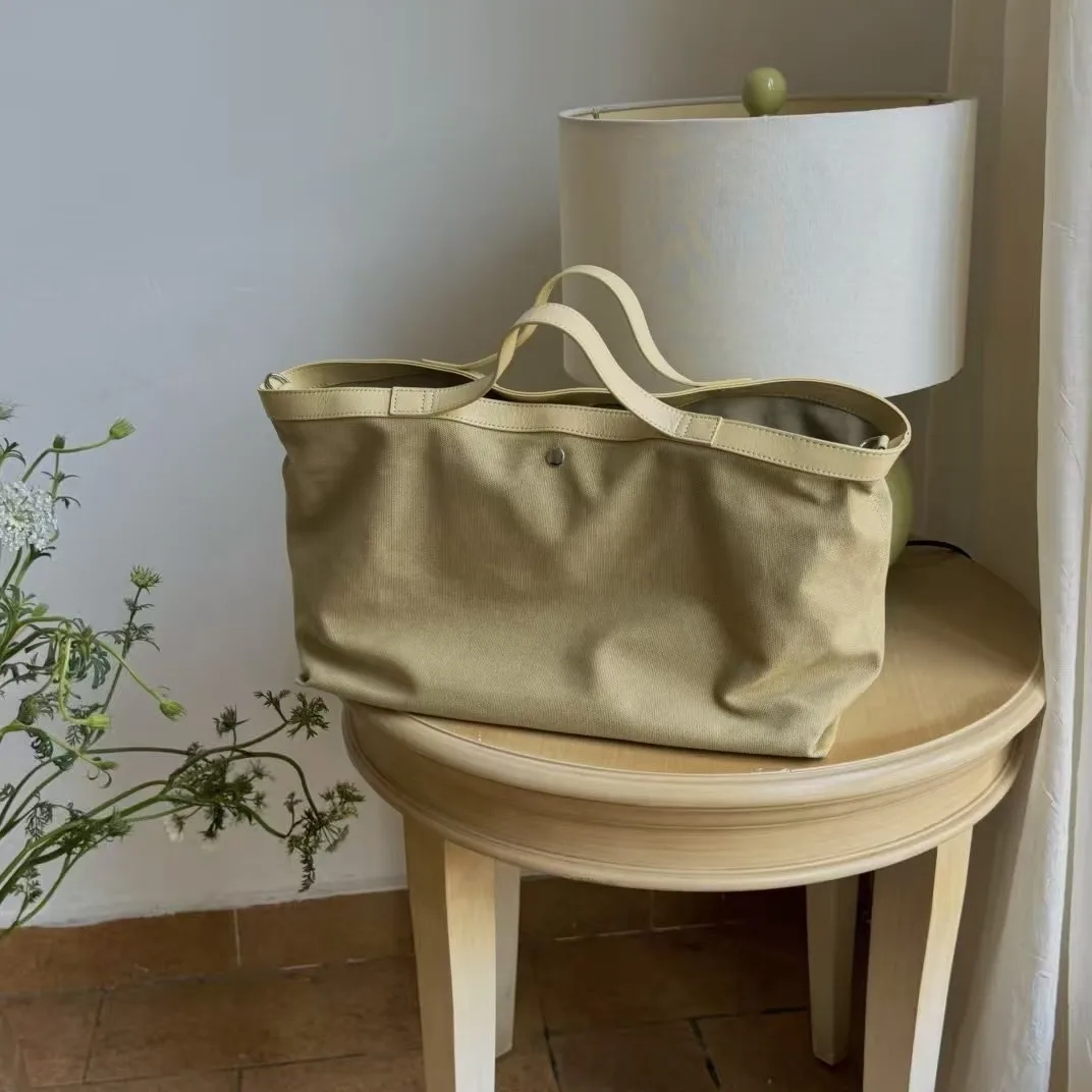 

FIRMRANCH Leisure Large Capacity High-Quality Canvas Paired With Leather Women's Hand-Held Commuting Bag Diagonal Cross Pouch