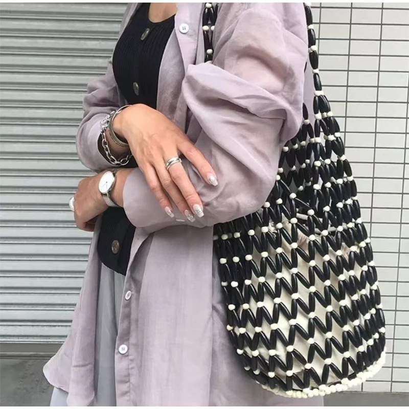 Holz Perle Gewebte Tasche Neue Design Marke frauen Hohl Perlen Meer Reise Vielseitige hand Schulter Unterarm Eimer Tasche – Detail 6