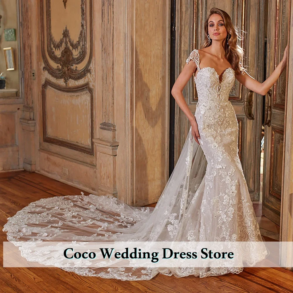 

Свадебные платья русалка на заказ с отстегивающимся шлейфом, открытой спиной, аппликациями, бисером и кристаллами.