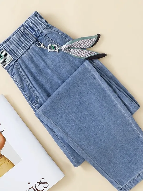 กางเกงยีนส์เอวบางยืดหยุ่นสำหรับฤดูร้อน รุ่นปี 2025 ทรงฮาร์แลน ความยาวเก้าส่วน สไตล์ลำลอง ไซส์ใหญ่ ทรงหลวม ผ้าไหมน้ำแข็ง ทรงกางเกงกะหล่ำปลี