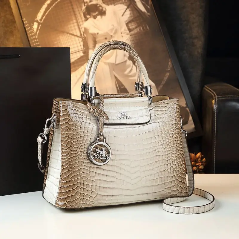 Gradient embossed structured handbag with metal round pendant, large capacity, suitable workplace and commuti