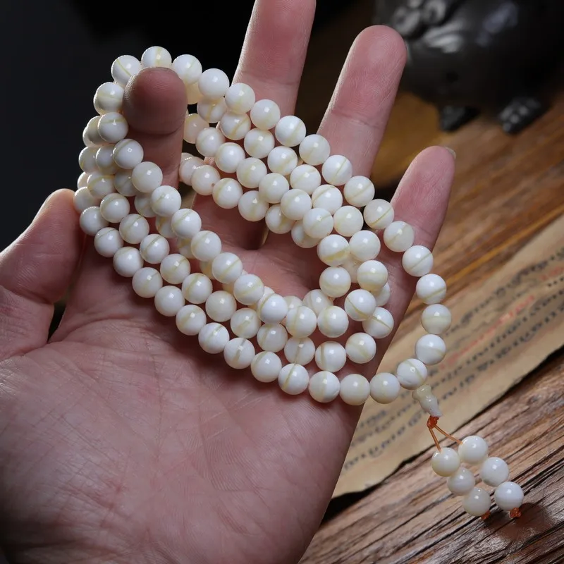 Natural gold-threaded single-strand shell bead necklace with 108 beads suitable for both men and women can be worn as a brace