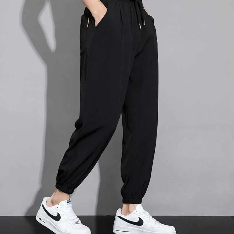 Ice silk pants for men in summer, thin casual pants, quick drying sports sweatpants, loose ankle pants, Haren pants