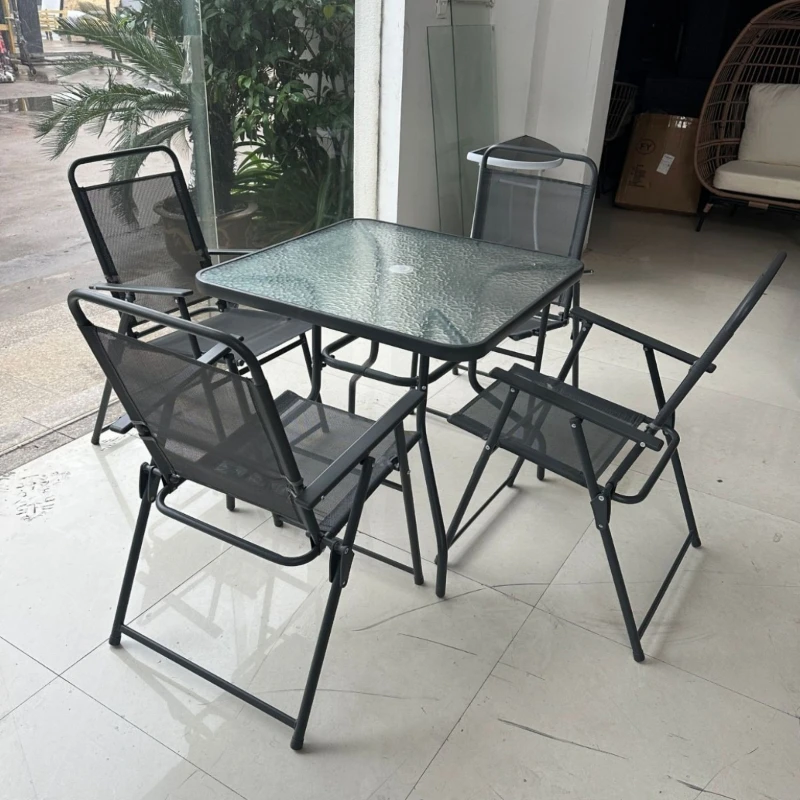 

Outdoor courtyard coffee table four-piece garden terrace villa rattan chair combination leisure hotel furniture folding teslin