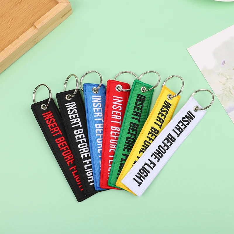 1PCS Car Key Ring Key Fobs Chaveiro INSERT BEFORE FLIGHT Keychain Jewelry Popular llaver Car Motorcycle Key Tag OEM Embroidery