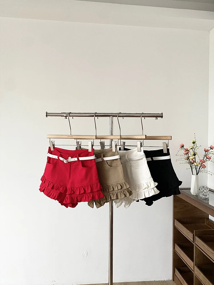 

Hong Kong style spicy girl with black fungus edge low waist A-line hot denim shorts women's 2025 summer slim fit shorts