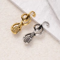 Fashionable and creative microphone note brooch, featuring unique design aesthetics. Perfect for adding a touch of elegance to s