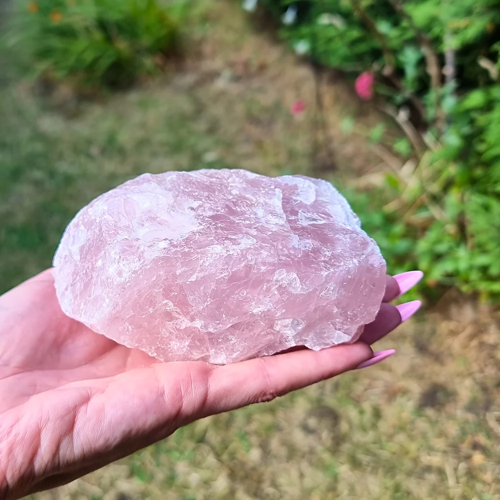Large, uncut rose quartz, a considerable piece of pink rose quartz, a palm-sized crystal—it would be the perfect gift.