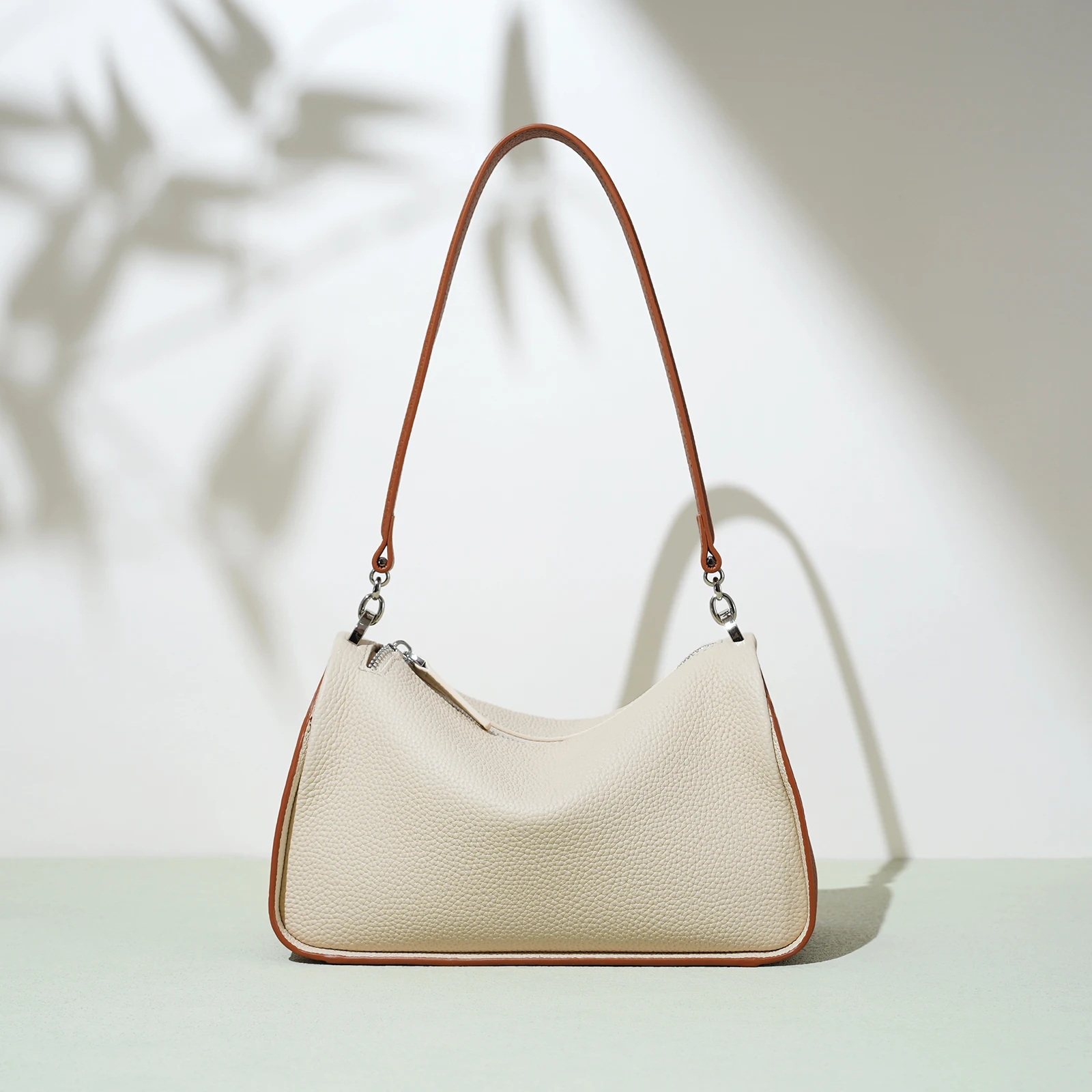 

A fashionable ladies' leather handbag, crossbody bag, shoulder bag, made of high-quality leather. Its design is unique, simple a