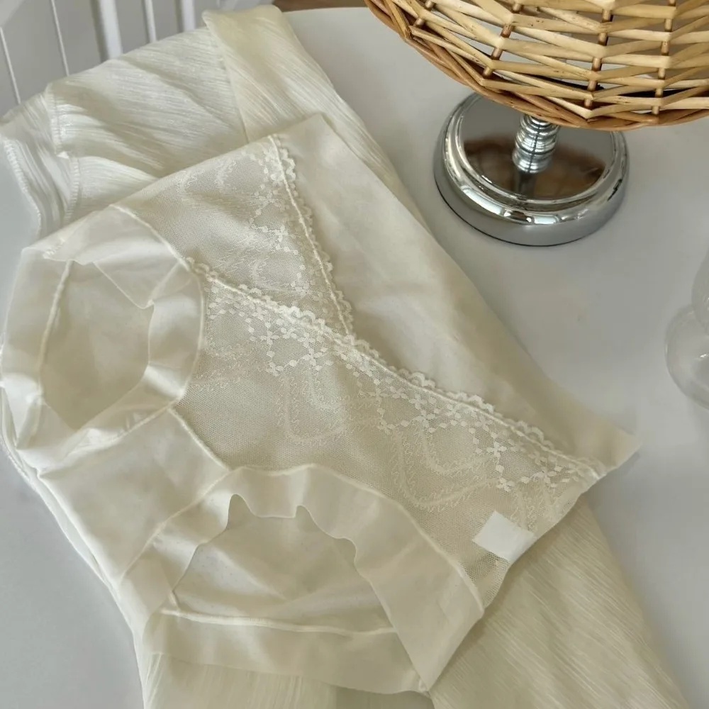 سراويل داخلية ناعمة متوسطة الخصر من الدانتيل الشبكي بدون خياطة ورقيقة من الحرير الجليدي ملابس داخلية شفافة للنساء والنساء