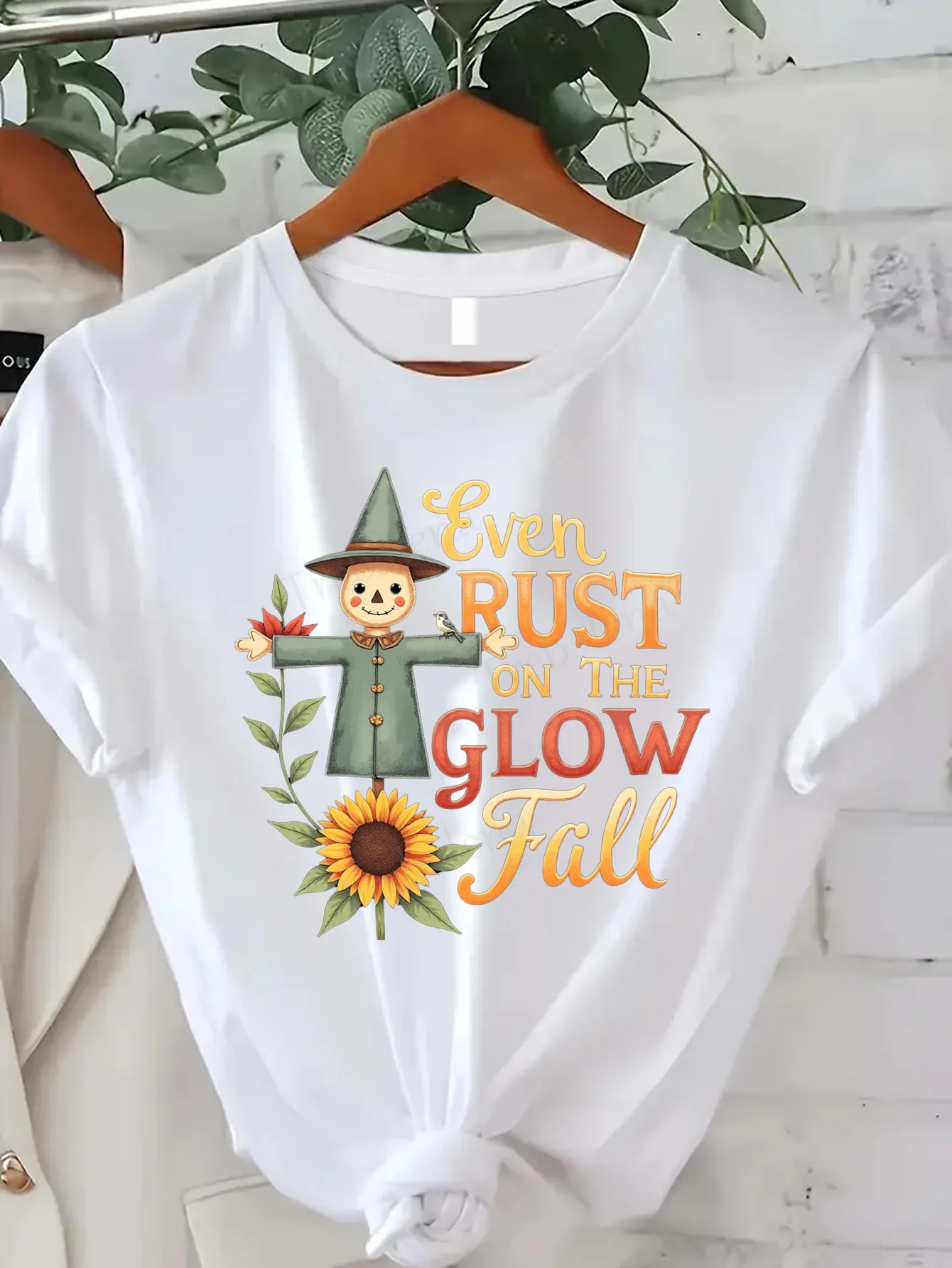 

Comfortable Women's Print T-shirt "Autumn Glow Scarecrow T-Shirt - Rustic Fall Harvest Design"