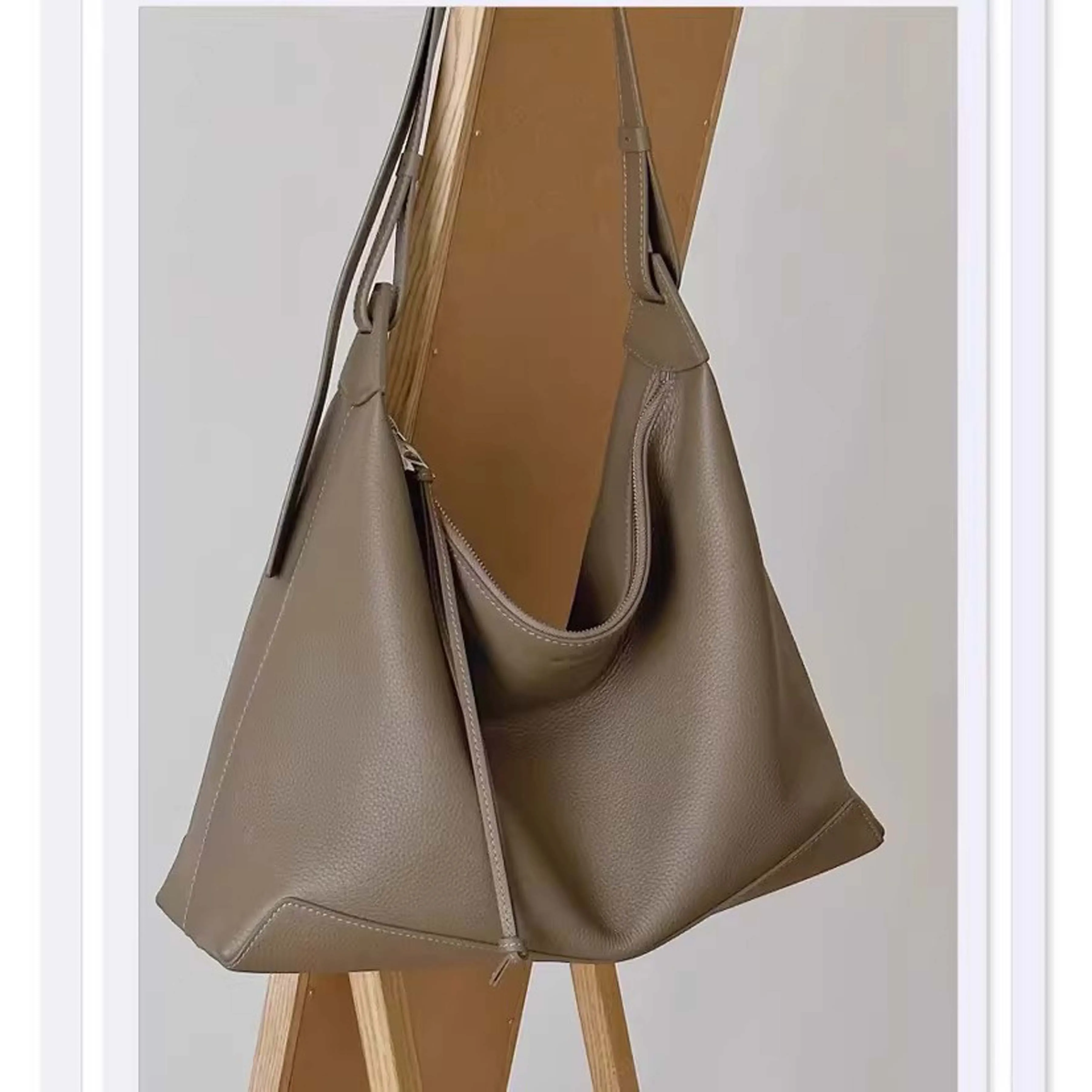 

Genuine Leather Women's Bag 2026 New Model Ladies' Lunchbox Bag Commuter Underarm Bag Single Shoulder Crossbody Bag High-End Large Capacity