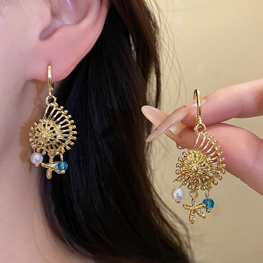 Gold-color fan shaped drop earrings with starfish beads and blue crystal accents for women summer beach accessories