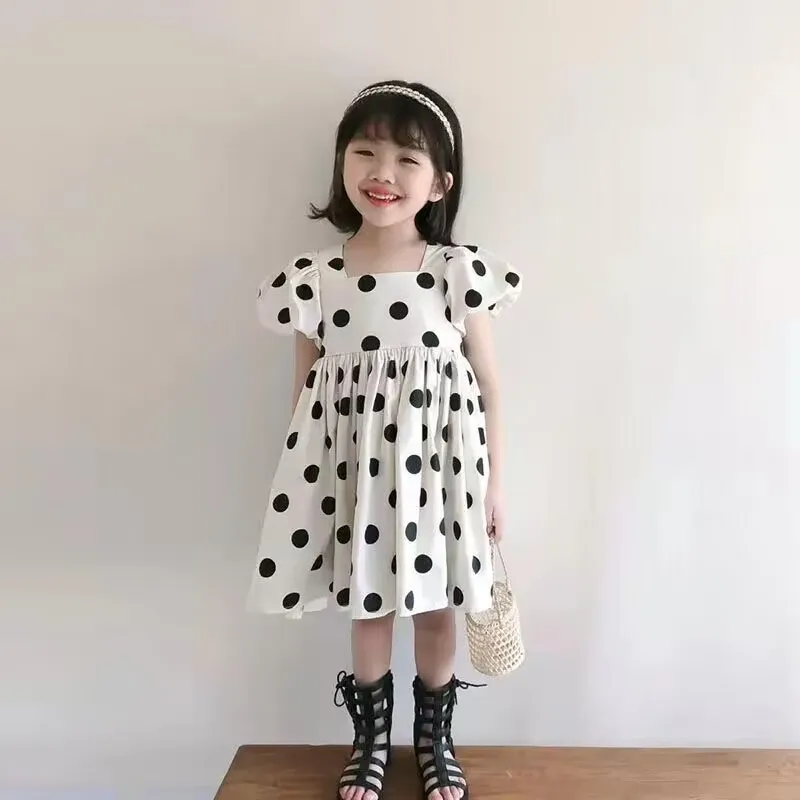 Vestido de verano de manga corta para niña, nuevo vestido de Princesa con lunares, edición coreana, manga de burbuja, espalda abierta