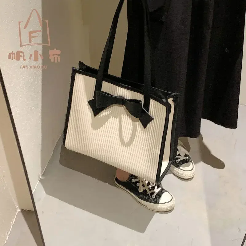 2024 New Sail Cloth Large Capacity Woman All-match Fashion Bowknot Simple Commuting Zipper Portable Single Shoulder Tote Bag