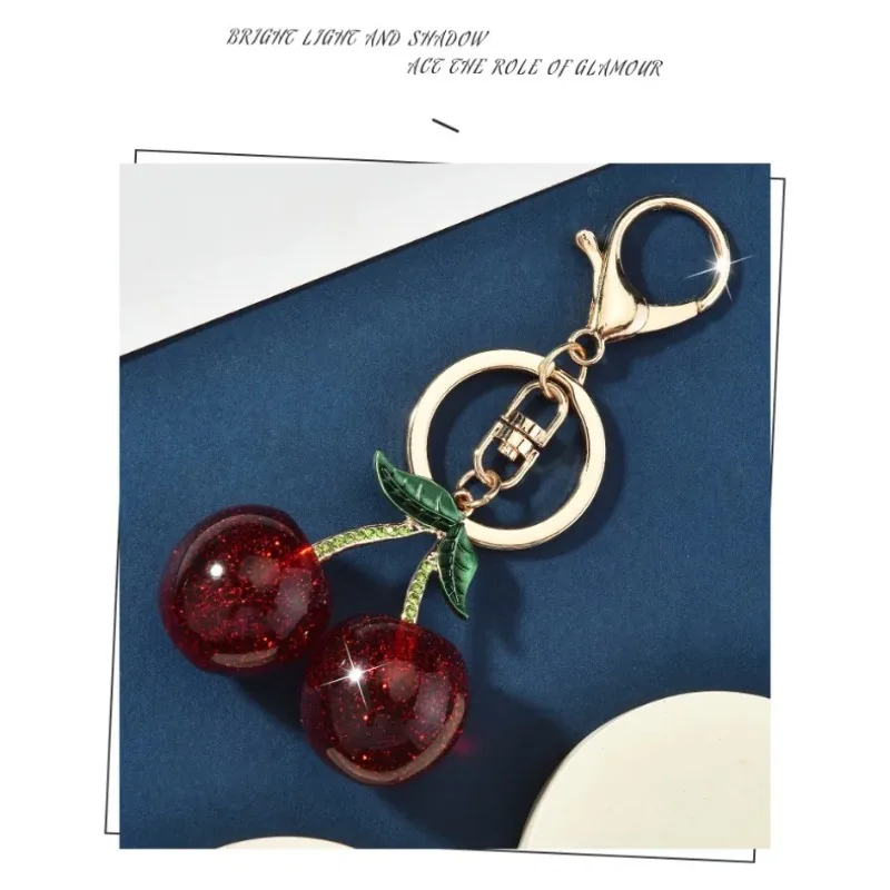 

Cute cherry key chain students, car bag pendants, mobile phone chain pendants, anti-loss pendants