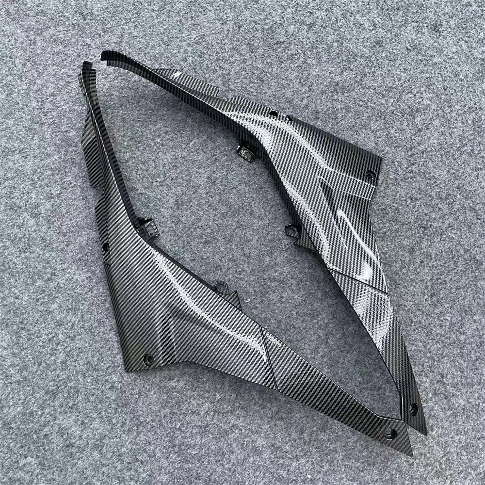 

ABS motorcycle fairings are suitable for RS457 fuel tank side plates, a pair of 24 and 25 2024 2025 carbon fiber paint