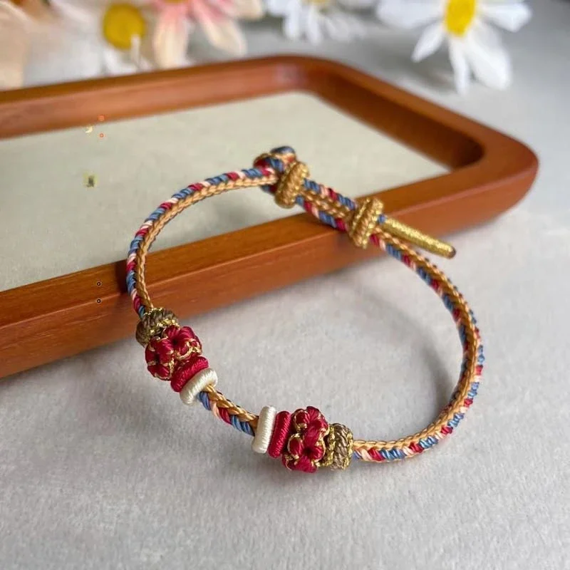 

Authentic Red String Bracelet for Good Luck and Fortune with Handmade Knots and Lucky Charms