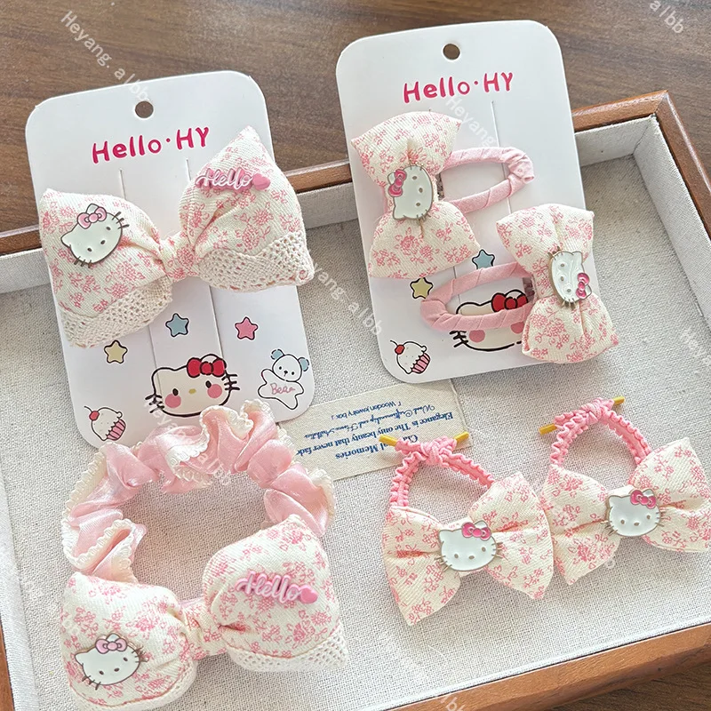 

Новинка Sanrio Hello Kitty, розовая заколка для волос с цветочным принтом, повязка на голову с хвостиком в форме сердца для девочек, студенческая кавайная универсальная заколка для волос