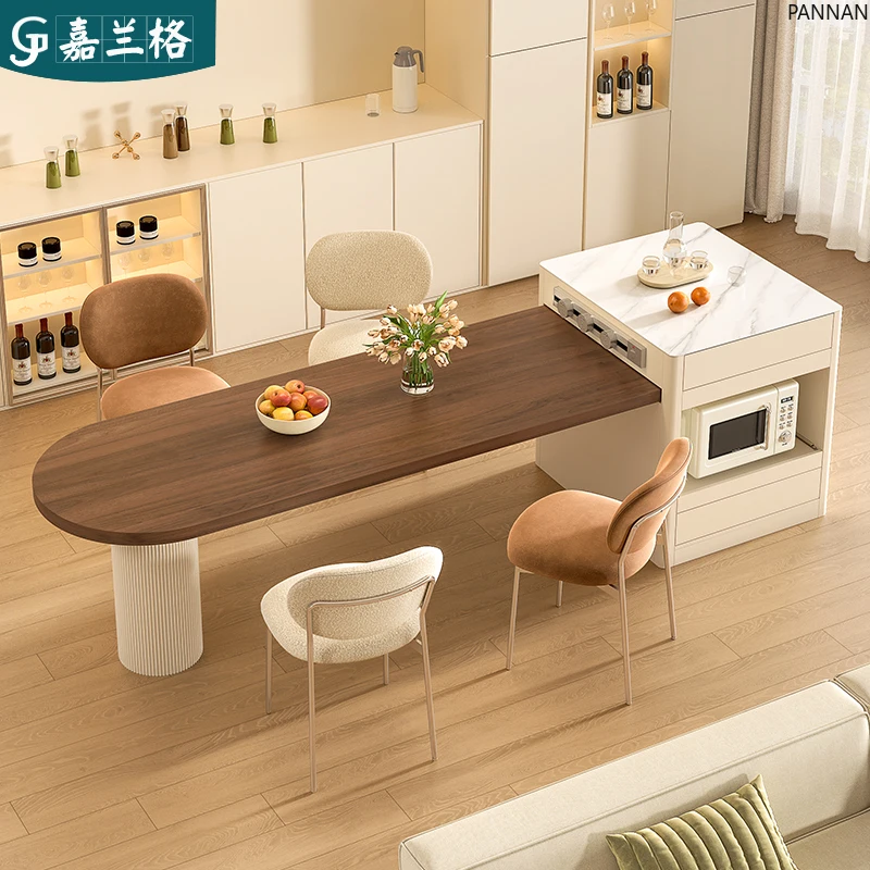 

Cream wind retractable island table integrated rock slab semicircular island table small apartment customization