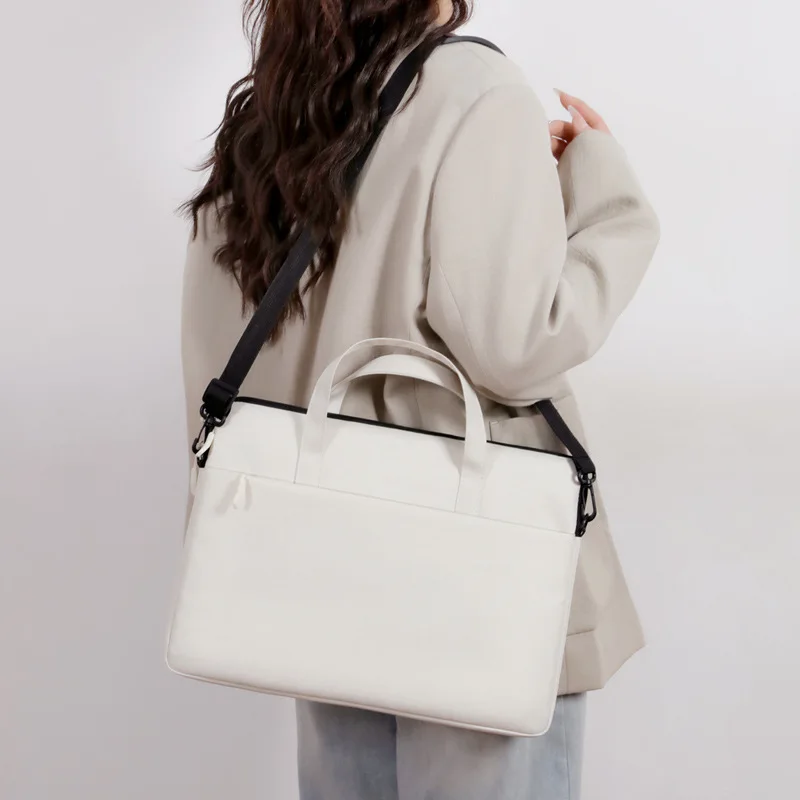 Europe and the United States new multi-layer laptop bag 15.6 inch ultra-thin liner bag large capacity simple slung briefcase.