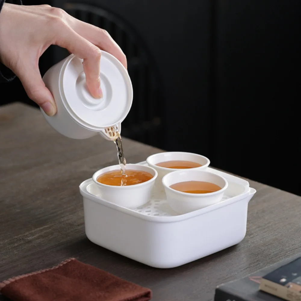 

Practical 1 Pot 3 Cups Portable Travel Tea Set Plastic Disposable Kung Fu Tea Set Integrated Storage Teapot Set Household