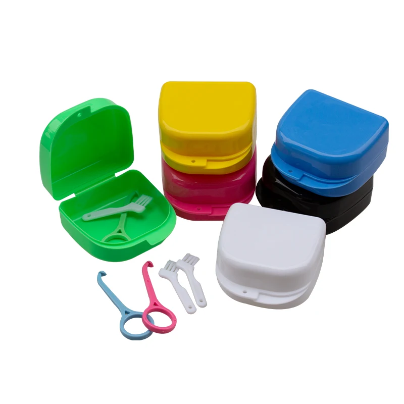 Dental full denture storage box, equipped with a cleaning toothbrush and an invisible braces remover