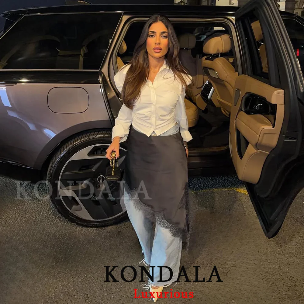 KONDALA مثير شيك الأسود الساتان الدانتيل النساء التنانير عالية الخصر غير النظامية ميدي تنورة الحفلات موضة 2025 مساء نادي حفلة فتاة تنورة