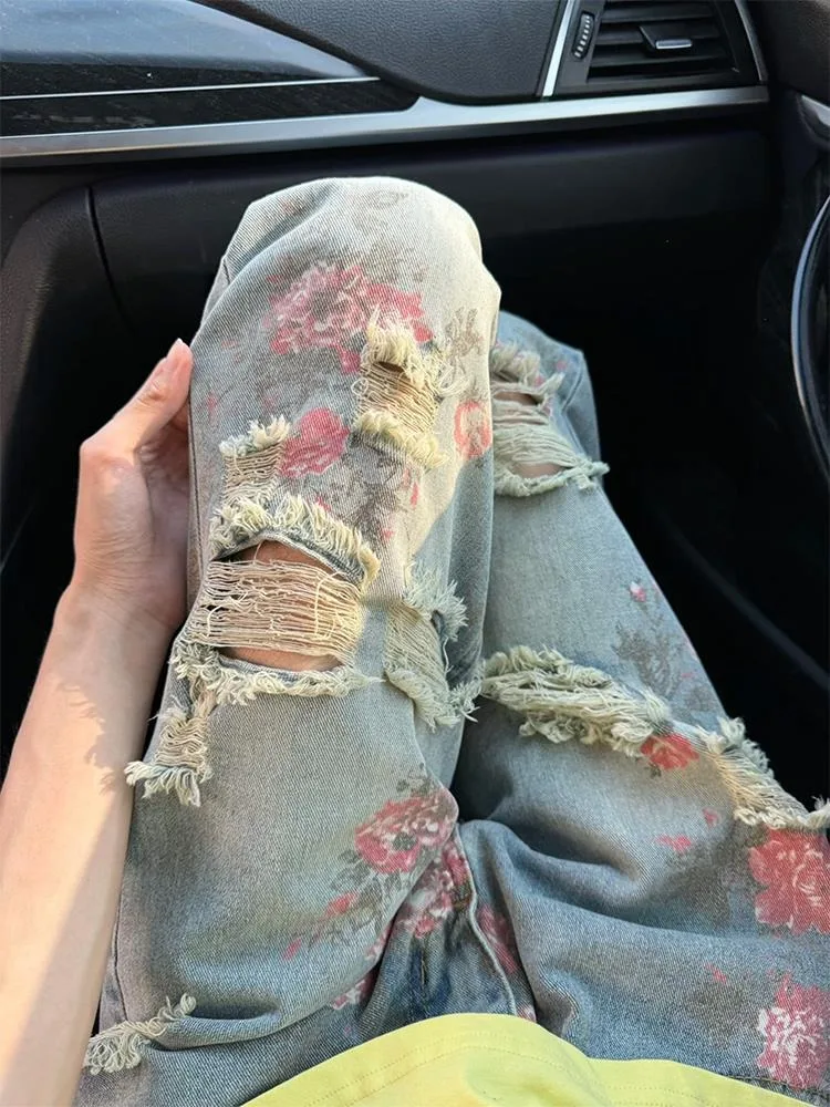 ローズフルプリントリッピングジーンズ女性の夏のスタイリッシュなハイエンドカーブナイフパンツハイストリートストレートレッグマイクロフレアパンツ