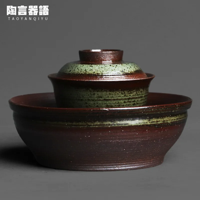 Firewood burn marks glaze ingot tea bowl rock mine clay material Kung Fu tea ceremony wide mouth hand holding tea bowl