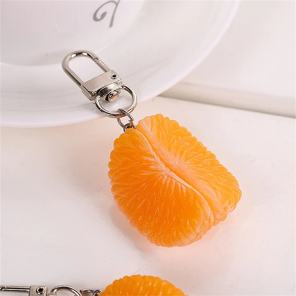 Divertido llavero de pulpa de mandarina naranja PVC lindo simulación fruta encantos bolso colgante accesorio joyería colgante llavero de regalo