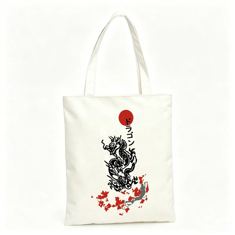 Women's dragon graphic canvas tote bag with red sun and floral design, ideal for casual daily use and shopping outings