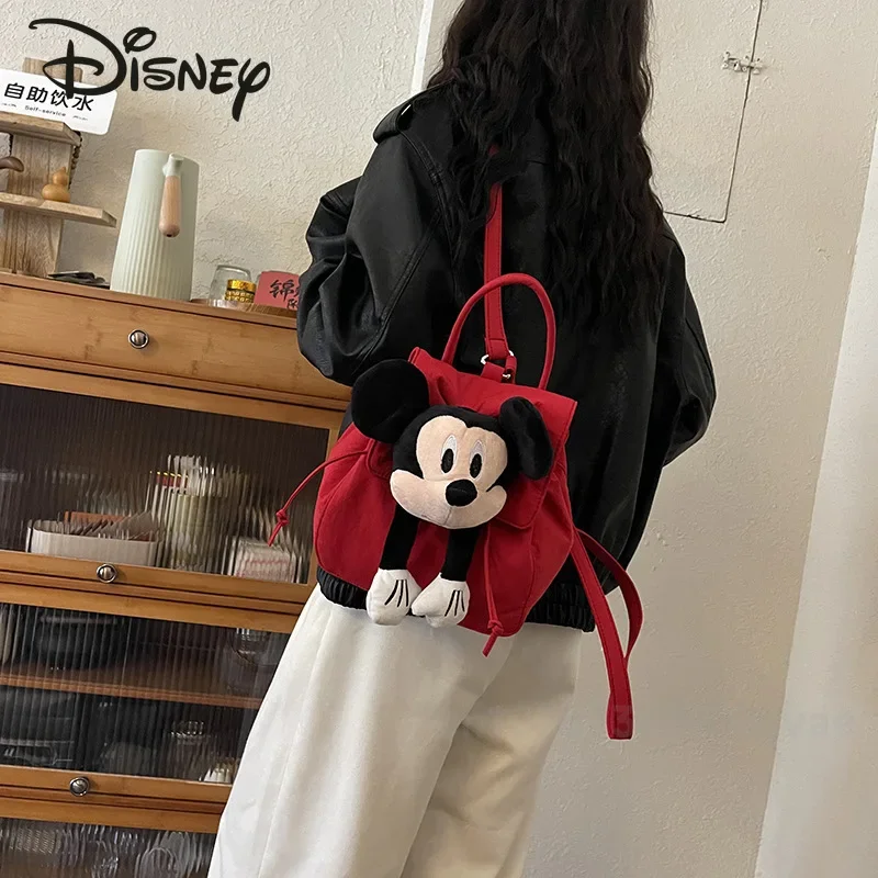 Mickey 2024กระเป๋าเป้แฟชั่นผู้หญิงใหม่, กระเป๋าเป้สะพายหลังตุ๊กตา3D คุณภาพสูงอเนกประสงค์สีทึบจุของได้มาก