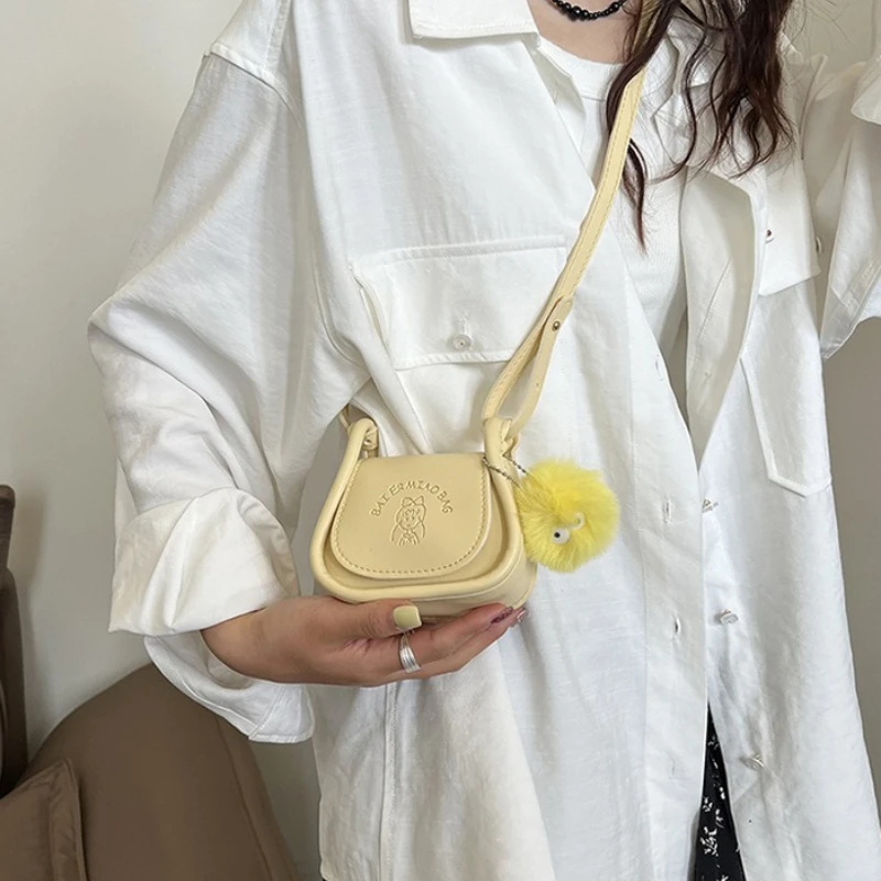 Fashion Women Mini Crossbody Bag with Fluffy Pom Pom Charm, Cute Embossed Saddle Wallets for Casual Summer Daily Shoulder Purse